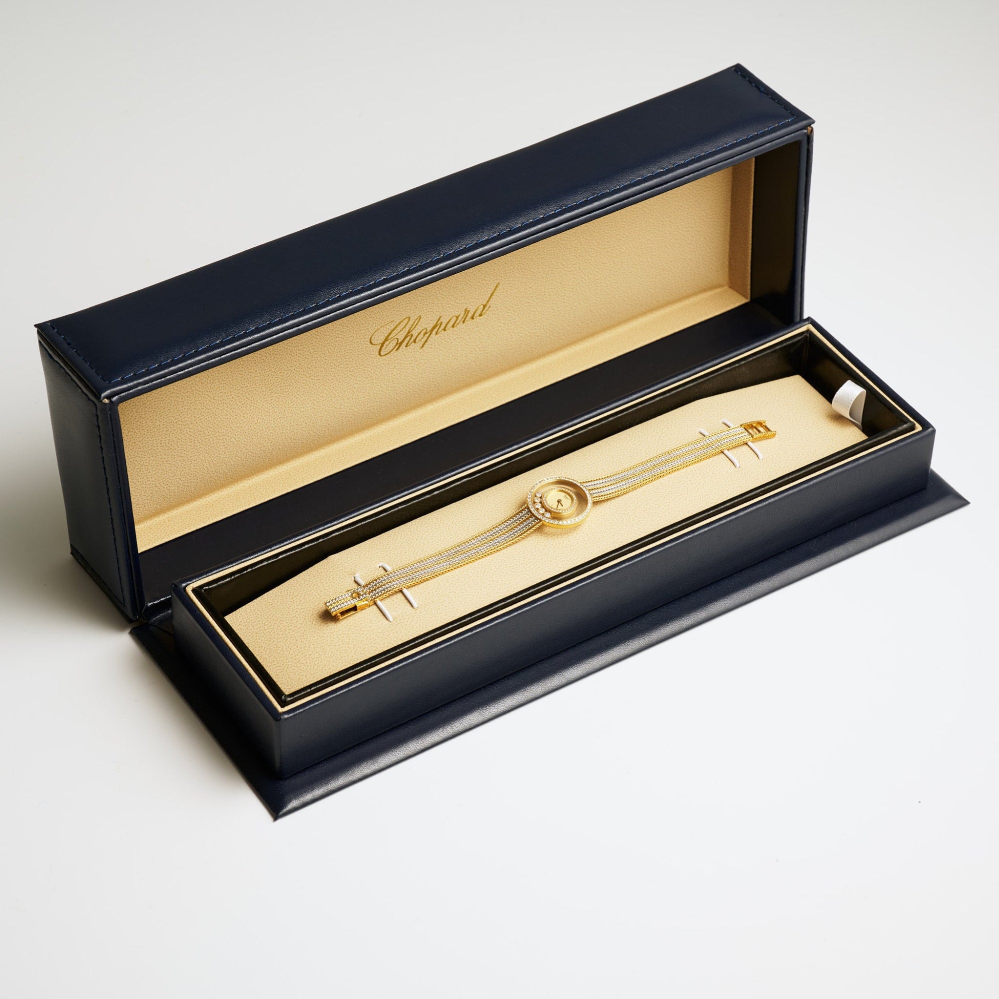 Chopard — "Happy Diamonds" Yellow Gold & White Gold